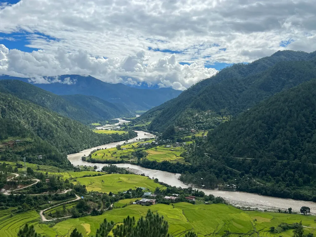 River winding through a wide green valley in Bhutan